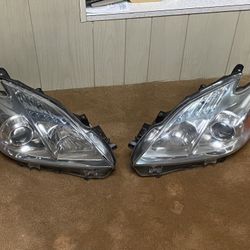 Toyota Prius 2010-2015 OEM Set of Left & Right Headlights. Comes In Original Box.