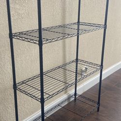 Metal Shelf Rack, Shelf organizer, 4 levels. H54”, Deep14”, W36”. In Clean and condition; West Boca 