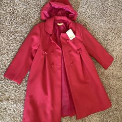 Beautiful and elegant winter coat for girl.