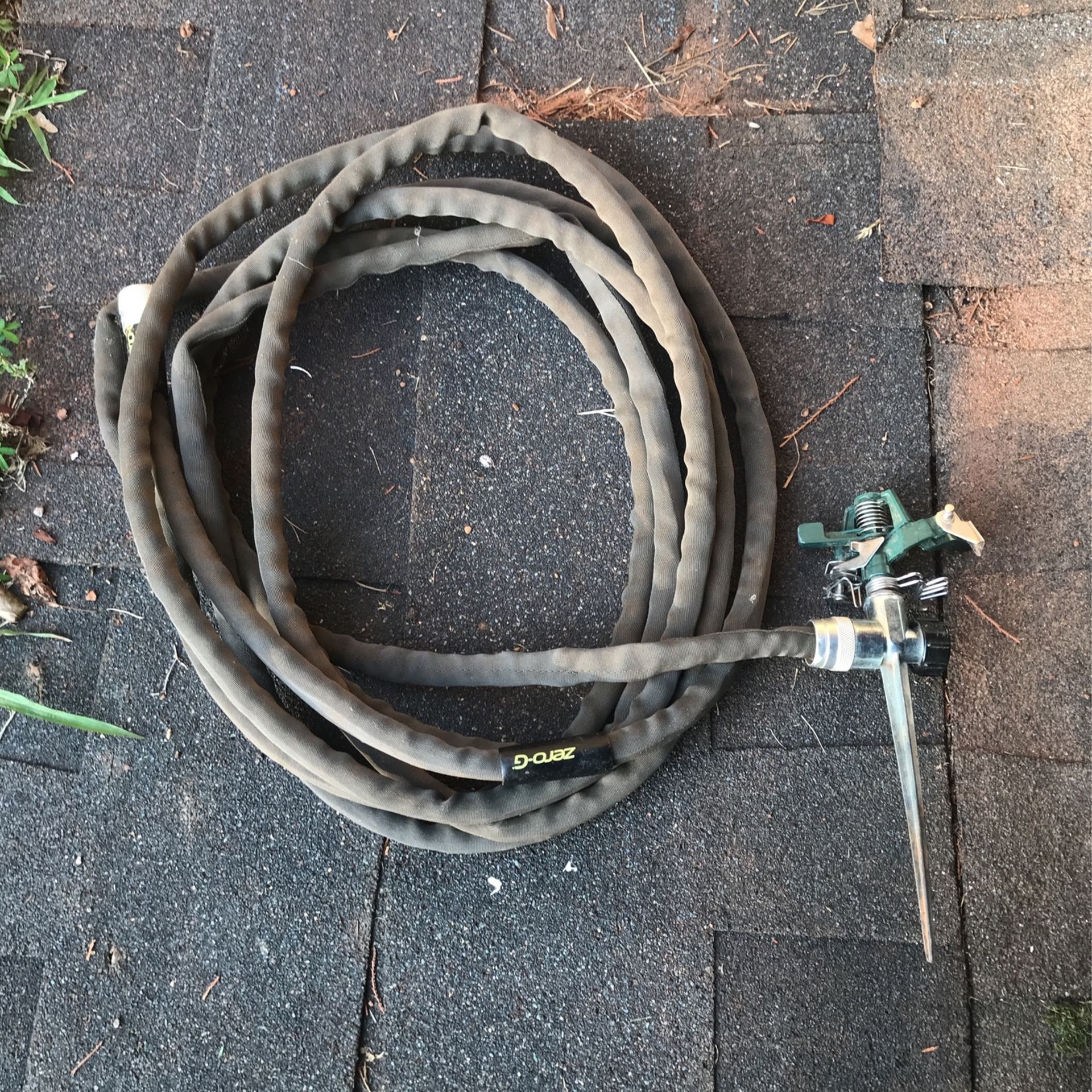 Non Kink Garden Hose And Sprinkler $10