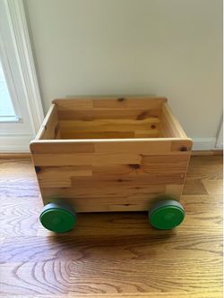 IKEA FLISAT solid pine toy storage with wheels