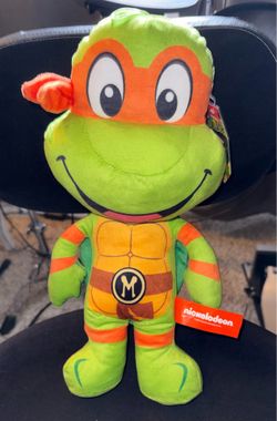 Nickelodeon Teenage Mutant Ninja Turtles Michelangelo plush toy.