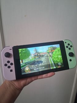 Nintendo  Switch  Handheld  comes with  mario game  works great  adult  owned