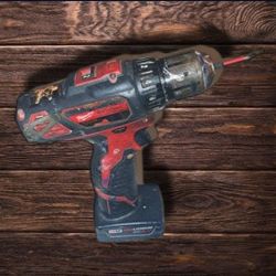 Milwaukee  M12 WORKS PERFECT        ⅜" Drill Driver W/ Battery (Used)