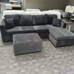 New Grey Sectional And Ottoman 