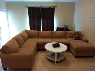 Basset 3 piece sectional couch with right side chase.
