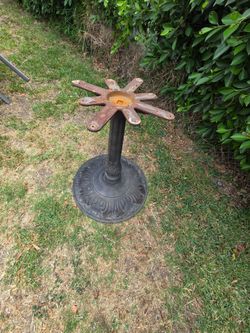 Cast decorative table base.