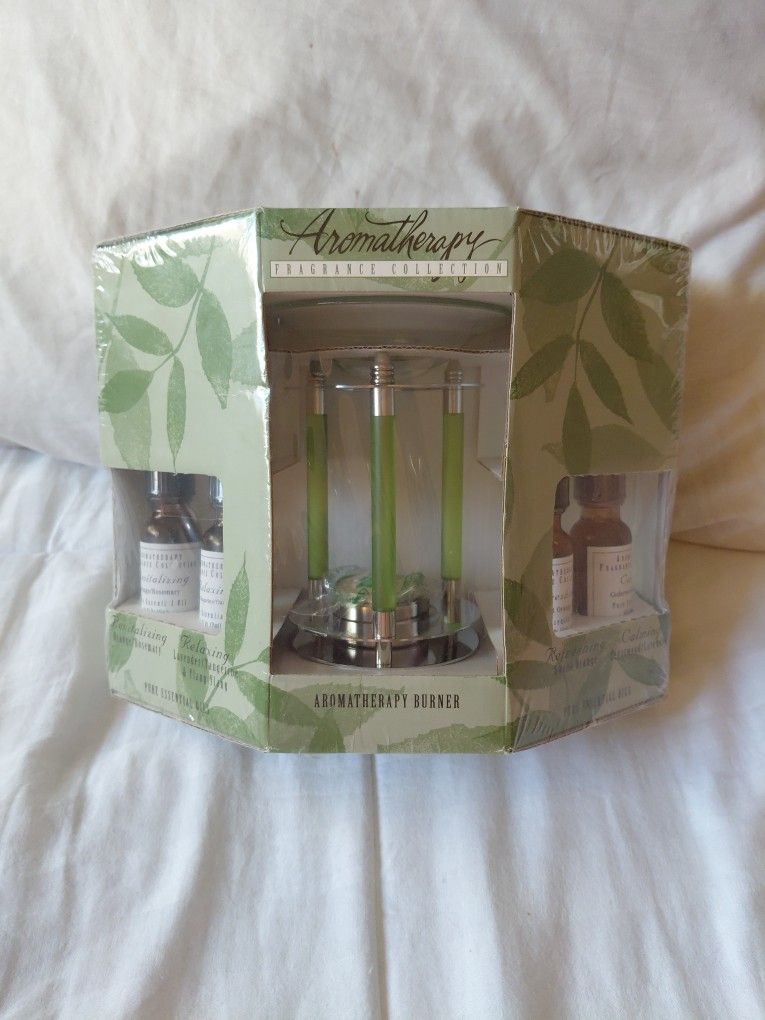 Aromatherapy "Fragrance Collection" aromatherapy burner set 4 Whit essential oils.