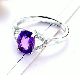 Brand new genuine amethyst and sterling ring. Fine jewelry with adjustable sizing.