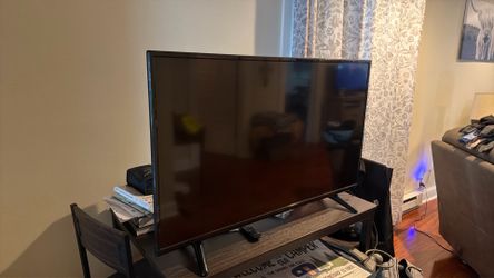 55 inch TV with remote