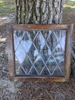 Architectural salvage antique leaded diamond paned window measuring approx. 28 3/8" wide x 27 1/2" tall x 1 3/8" thick...asking $100.00