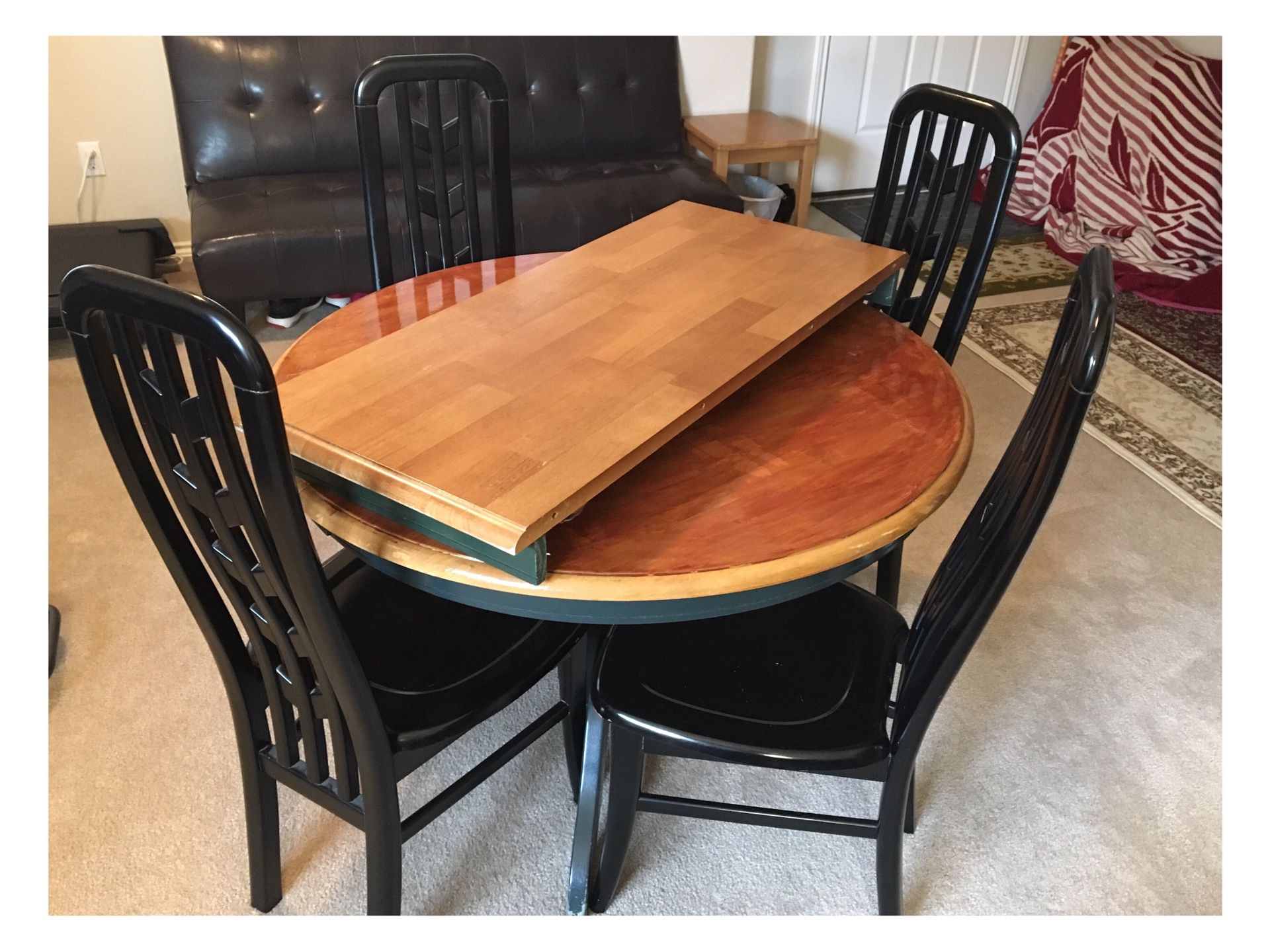 Beautiful round dining room table with leaf and 4 chairs for Sale in
