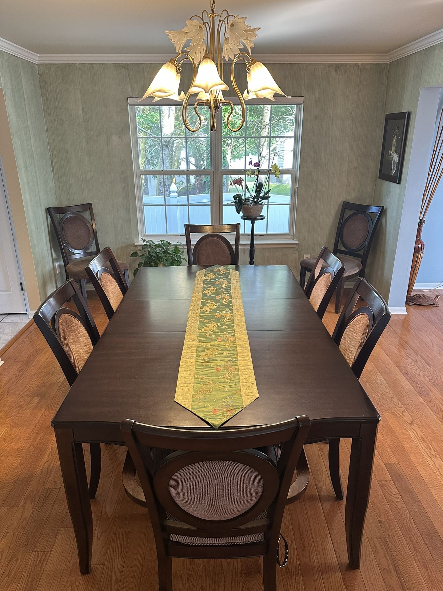 Large formal dining table with 8 chairs