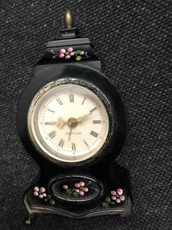 Westclock plastic case alarm clock needs mainspring and leg missing in front