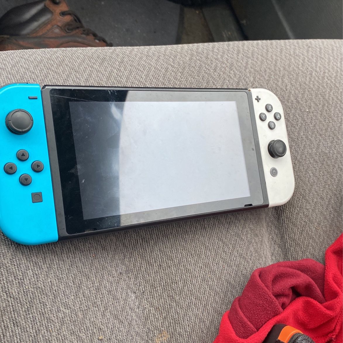 Nintendo switch slightly used But In Great Condition Comes With 4 Downloadable Games