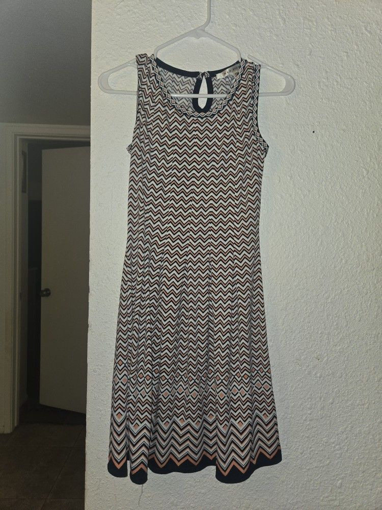 dress with black, white, and orange colors