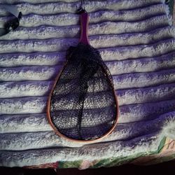 Fly fishing net. 
