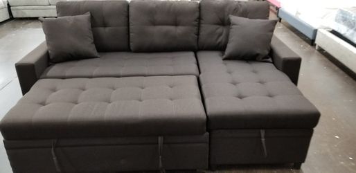 Chocolate sofa chaise sectional with a pullout bed