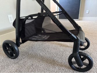 Black and Beige EvenFlo stroller