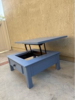 Coffee table - lifts to eating table