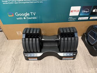 Selling a pair of Proform 50 pound adjustable weight dumbells