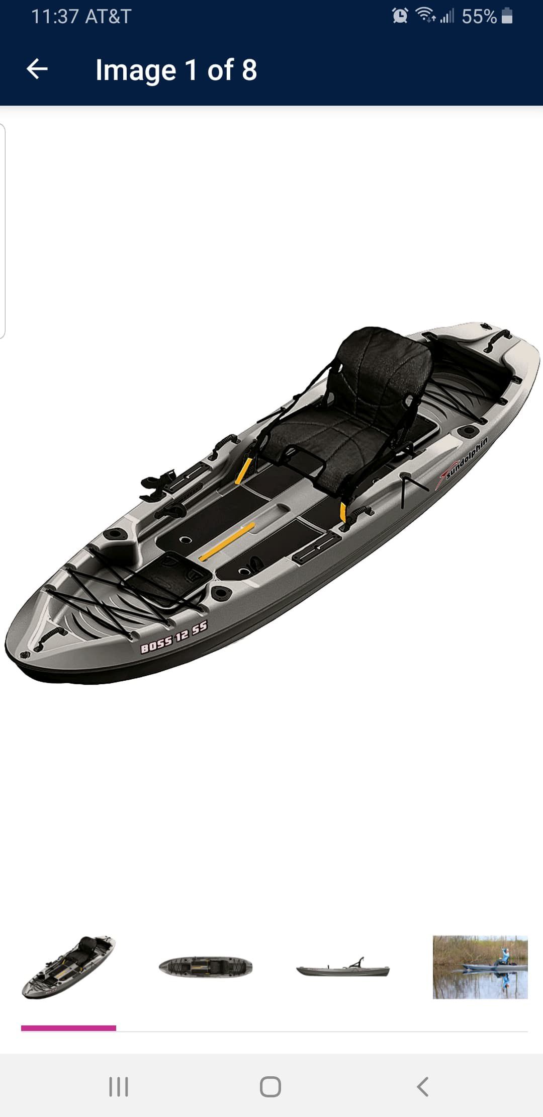 Boss 12 ss kayak with paddle used 3 times