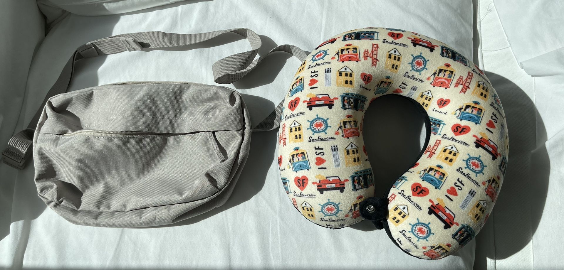 Both Muji crossbody bag and travel pillow