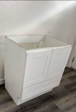 White bathroom vanity with drawer
