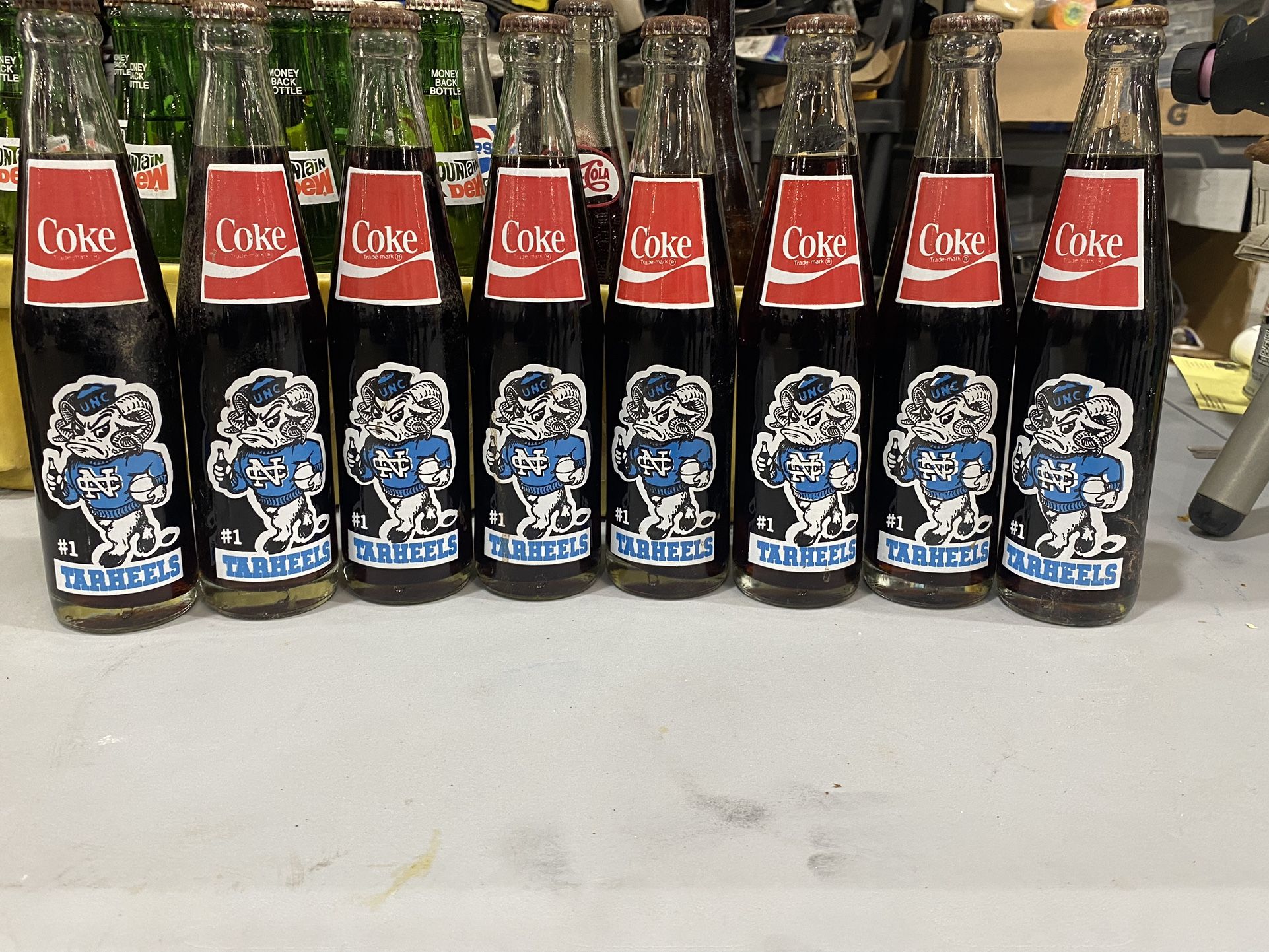 Coca Cola collectables tar heel full bottles