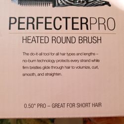 New In Box...heated Hair Brush 