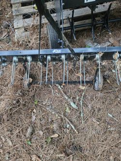 Yard dethacher for lawnmower
