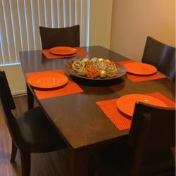 Beautiful brown table That Comes With The  Slat That Makes The  Table Longer 