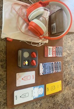 Yoto player, headphones and story cards