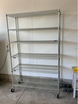 Rolling metal shelf