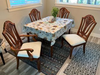 4 Solid wood dining chairs available