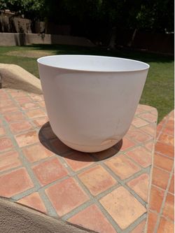 Big white plastic planter