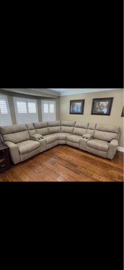 Light grey / brown couches