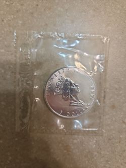 1990 Canada Maple Leaf 1 oz 999.9 Silver Coin. Sealed