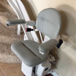 Bruno Elite Curve Model CRE-2110 stairlift, which features a custom curved rail design.