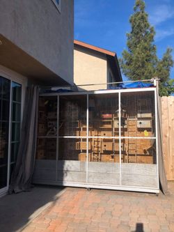 bird cage comes with everything inside except for the birds