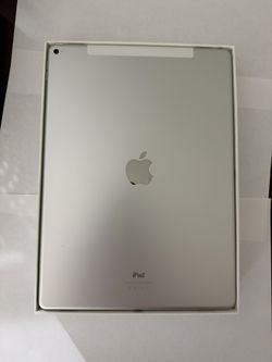 Apple iPad Pro ( 1st Gen ) 12.9" Silver  (Wi-Fi + Cellular) 128 GB. With Silicone Cover, Charger and charging cable