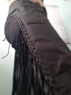 Harley Davidson women's chaps with fringe mint condition /black- leather tie front/braided with buckle
