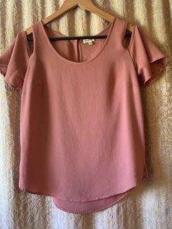 Brand New beautiful women’s blouse!! Small size runs big!!