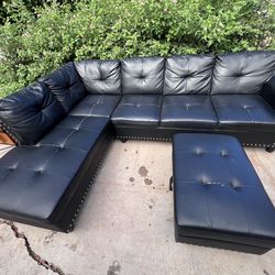 Black leather L-Shaped sofa w/ottoman