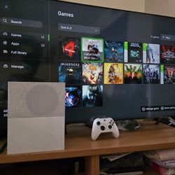 Xbox One S with Resident Evil Village, Resident evil 5 Injustice and more