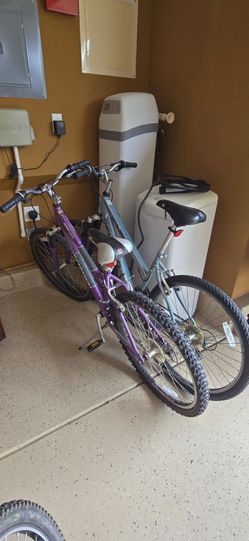 Two Mountain Bikes Purple and Silver