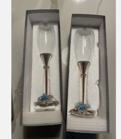 Two Isabella Adams Champagne Flutes.