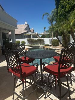 Bar height metal patio table with 4 chairs