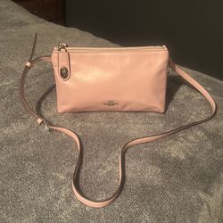 Coach pink crossbody  leather  medium  silver good condition
