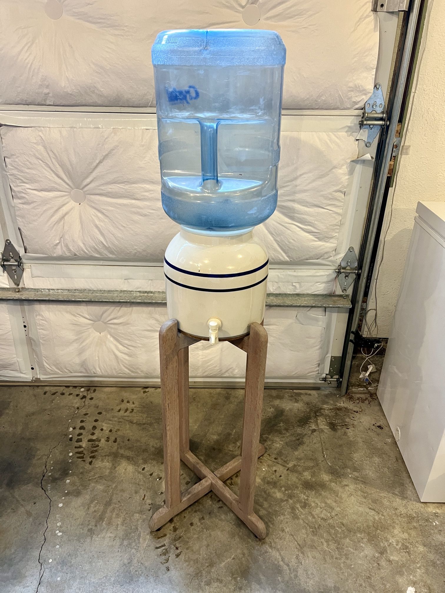ceramic water dispenser, stand & 5 gallon plastic jug